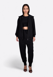 Front view of luxury black zip-through jacket, East Vibe